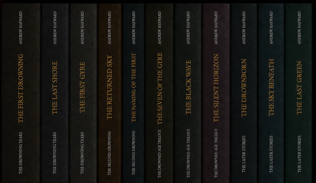 Eleven cloth-bound volumes on a shelf, spines lettered in gilt: The First Drowning, The Last Shore and The First Gyre of The Drowning Years; The Returned Sky and The Naming of the First of The Second Drowning; The Seven of the Gyre, The Black Wave and The Silent Horizon of The Drowned Age Trilogy; The Drownborn, The Sky Beneath and The Last Green of The Later Stories